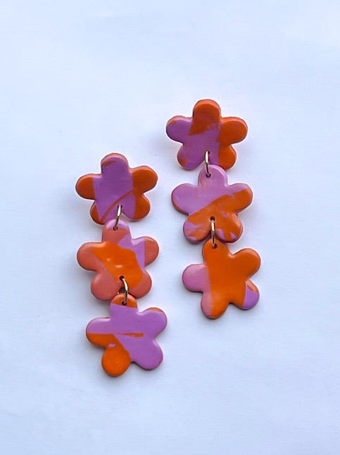 Oorbellen met paars / oranje bloemen