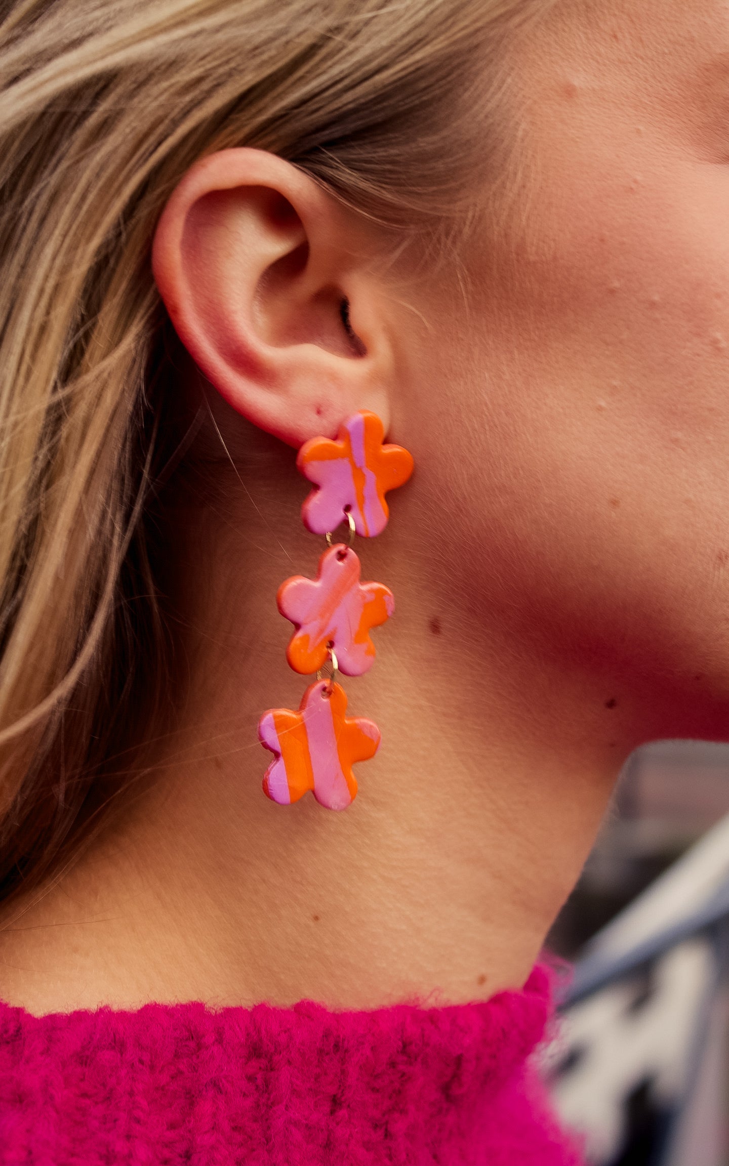 Oorbellen met paars / oranje bloemen