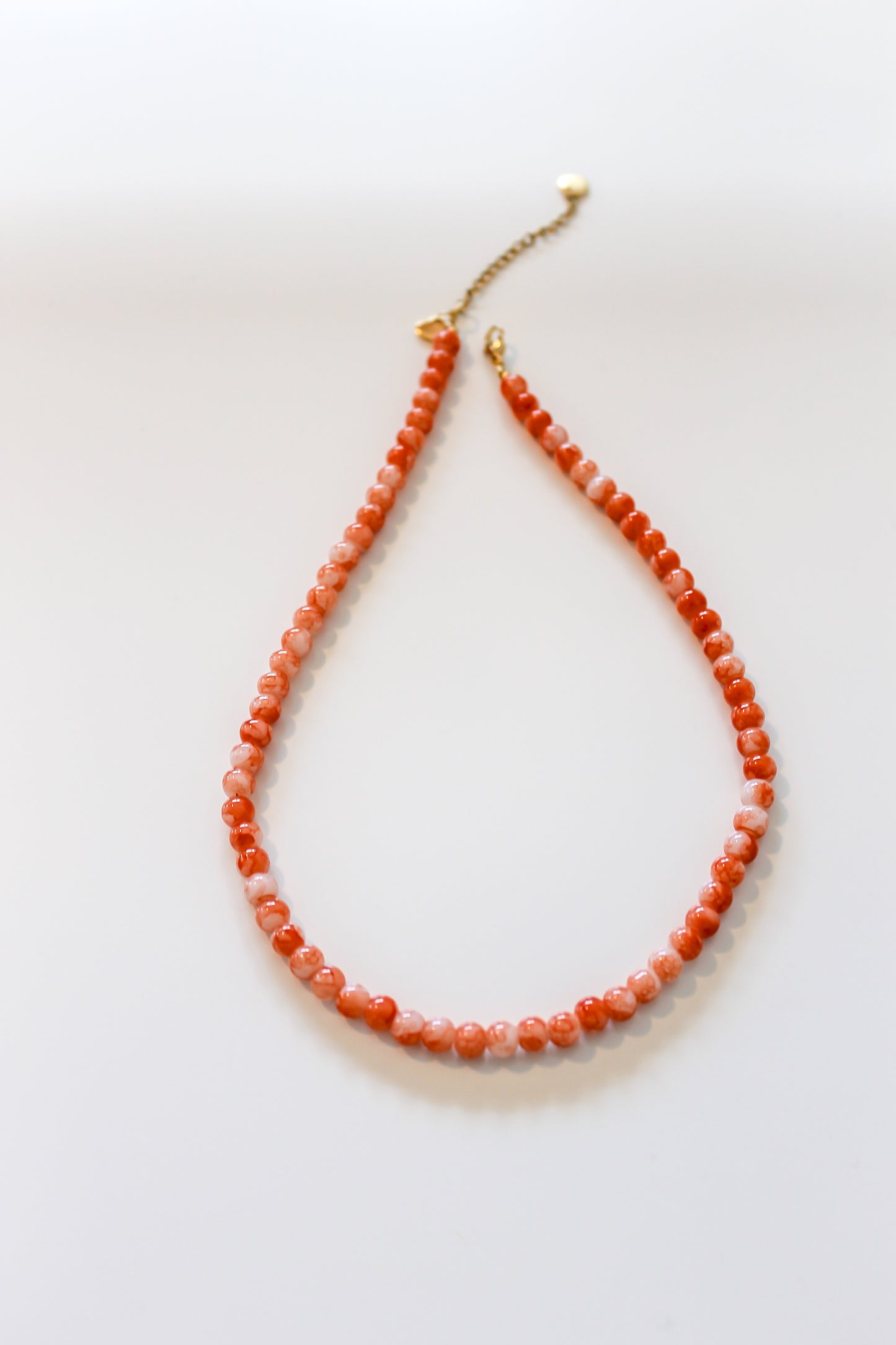 Oranje kralenketting